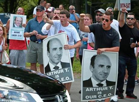 Market Basket workers demonstrated at a job fair for potential replacements in Andover last week.
